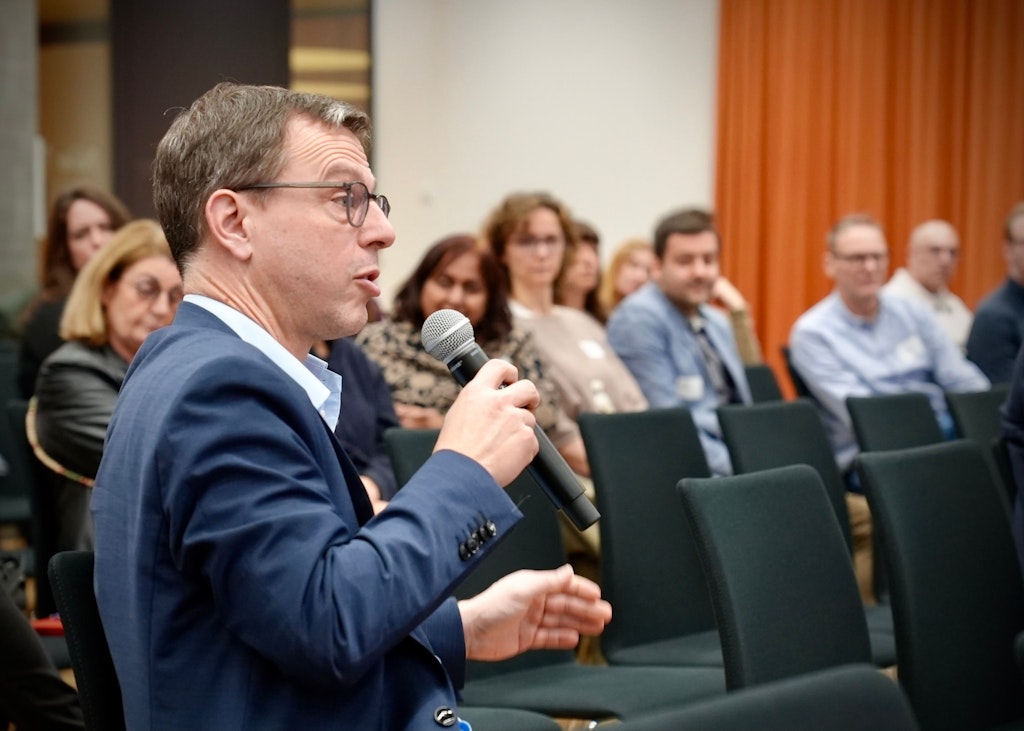 Workshop participants talking to each other